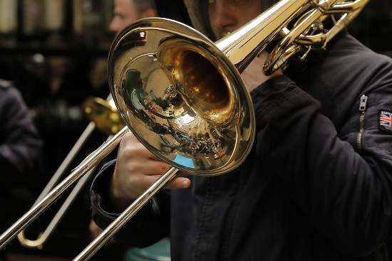 Brass trombone being played